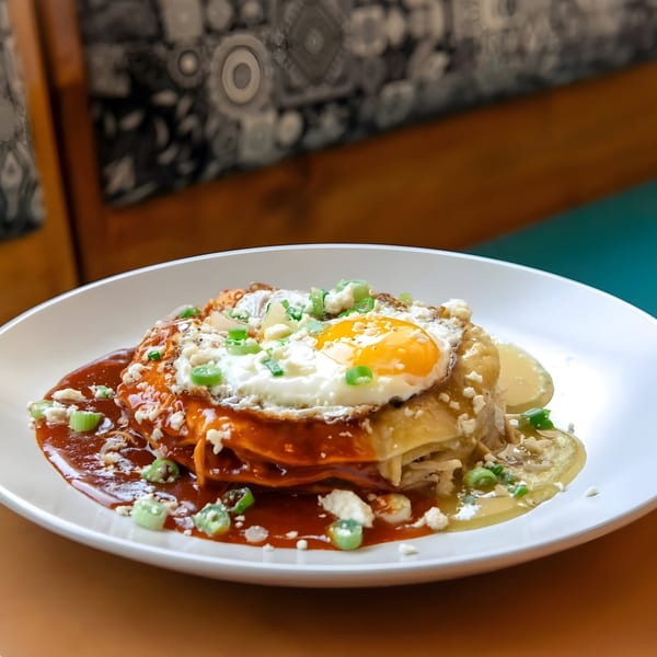 Jefe's Cantina + Cocina's chilaquiles with red and green sauce, topped with a fried egg.
